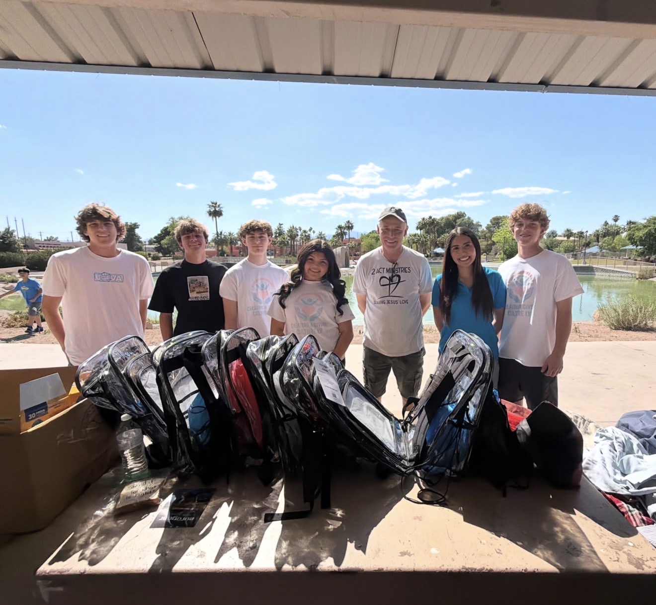 Creating a Giving Culture LV youth volunteers with 2ACT Ministries and packed backpacks
